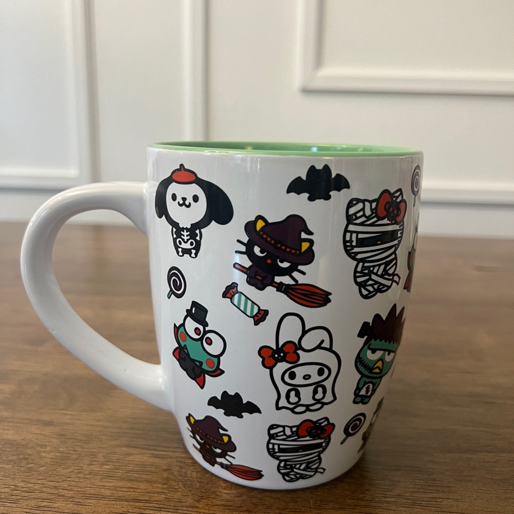 Hello Kitty and friends in a spooky Halloween mug